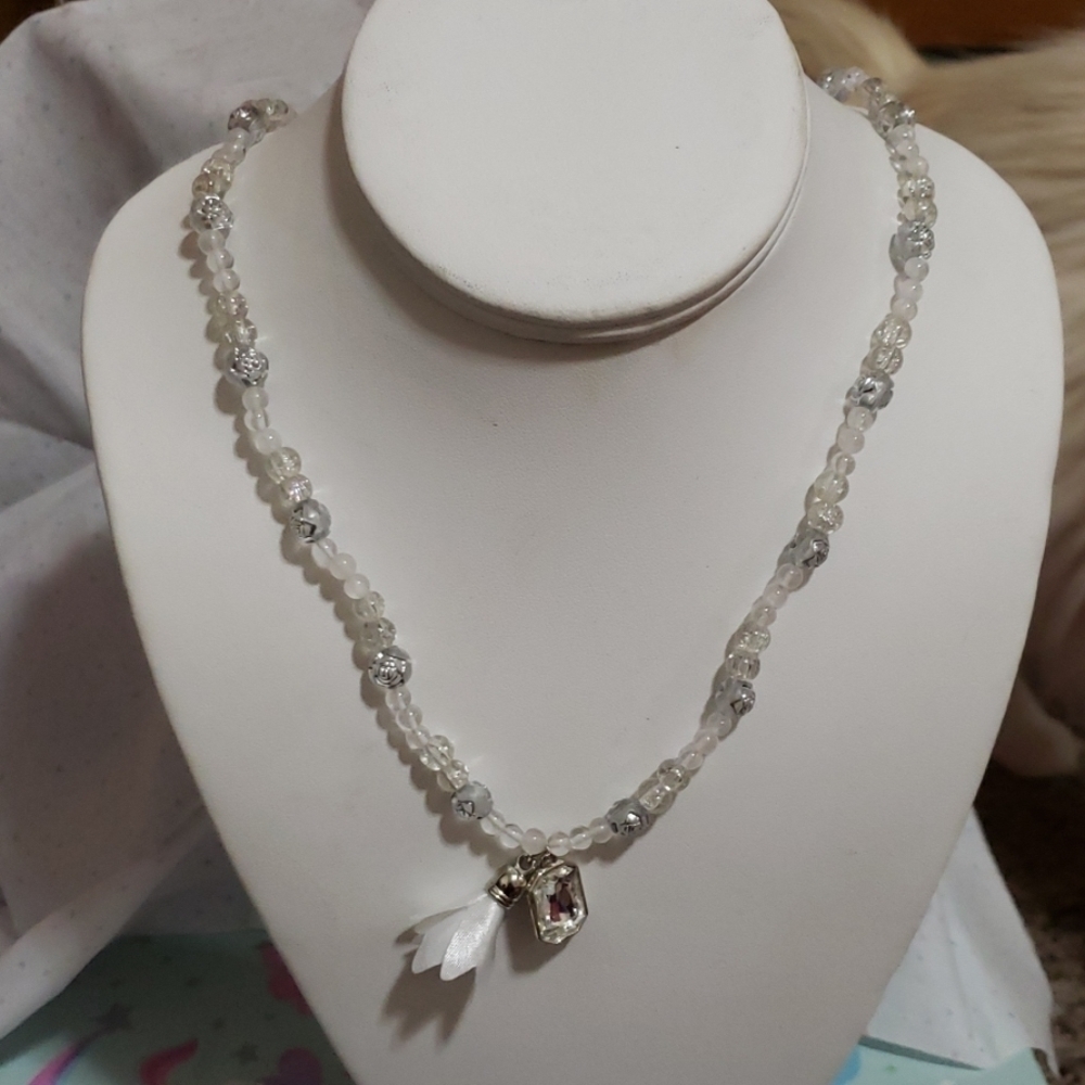 White & silver necklace with white crystal pendant